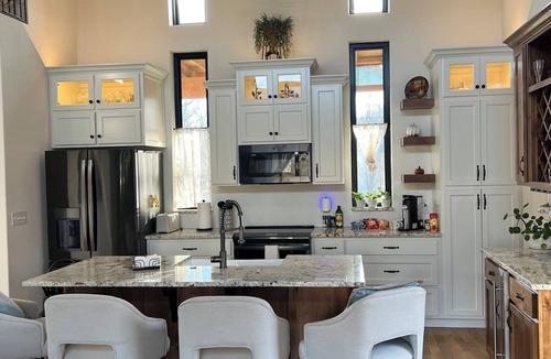 Joplin Villa | Beautiful Modern mountain getaway overlooking water with fountain.
