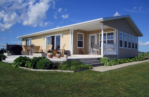 Borden-Carleton Cottage | Beautiful oceanfront beach house,family friendly,WiFi,lg deck,bbq .