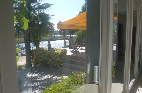 Baden Apartment | Beautiful outbuilding on property, seafront and golf course