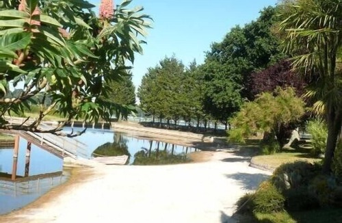 Baden Apartment | Beautiful outbuilding on property, seafront and golf course