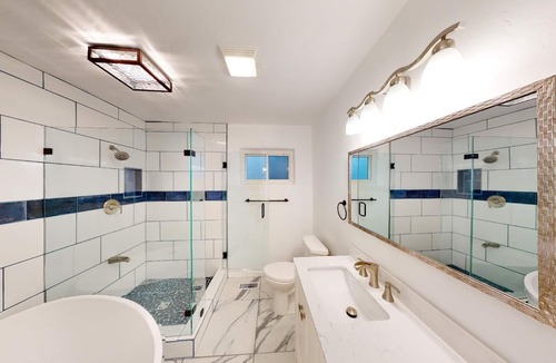 Uptown House | Beautiful Remodeled Single Family Home Near Freeway Access Shopping and Dining