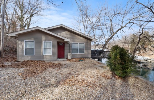 Camdenton House | Beautiful spacious lake front home in quiet cove with dock
