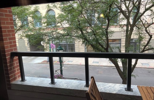 Downtown Syracuse Apartment | Beautiful Suite with Balcony overlooking Warren St in Syracuse