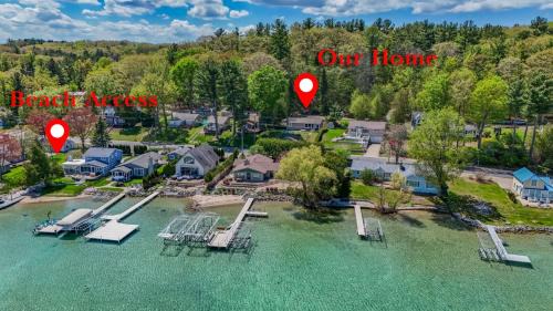 Rapid City House | Beautiful Torch Lake House with Beach Access