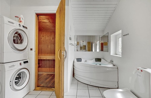 Vejers Strand House | Beautiful vacation home with pool on a large natural plot and placed in a well-established vacation