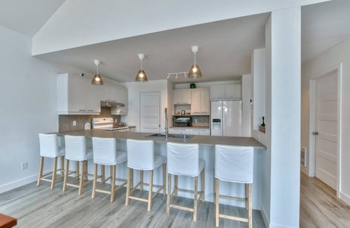 Mille-Isles Ski Chalet | Beautiful waterfront cottage on a pristine lake in Morin Heights