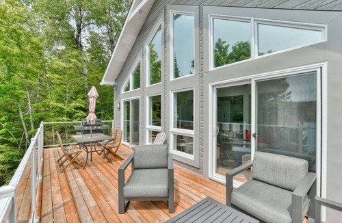 Mille-Isles Ski Chalet | Beautiful waterfront cottage on a pristine lake in Morin Heights