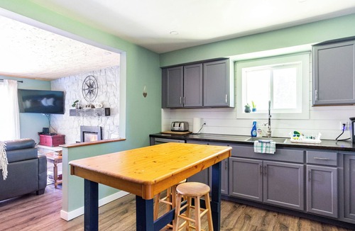 Ivanhoe Cottage | Beautiful waterfront cottage w/hot tub, firepit, fireplace and so much more!