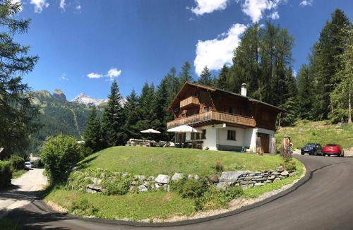 Ovronnaz Ski Chalet | Beautiful Wooden Chalet set in private woodland and garden with stunning views.