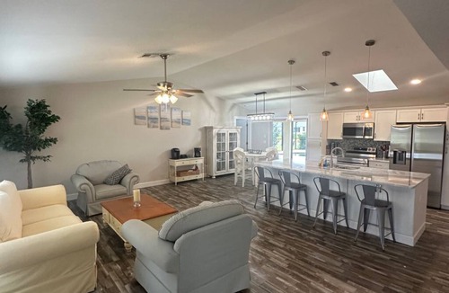 Pebble Beach House | Beautifully updated canal waterfront 3/2 house with heated pool in Rotonda West.