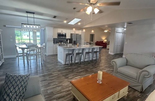 Pebble Beach House | Beautifully updated canal waterfront 3/2 house with heated pool in Rotonda West.