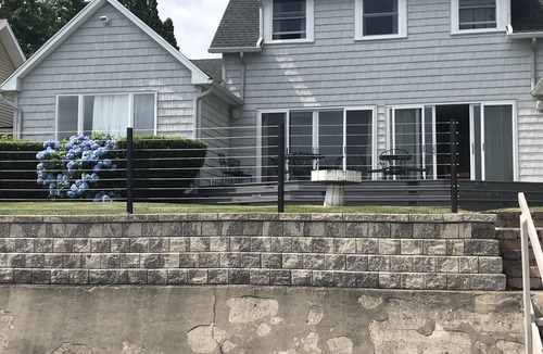 Sodus Point House | Beautifully updated home on the bay and golf course with dock and raised deck!