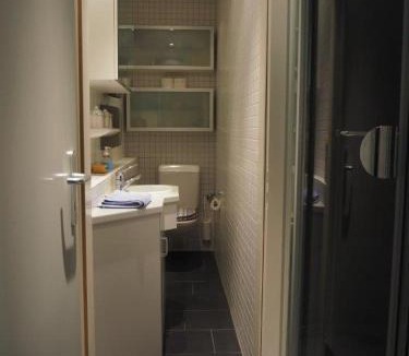 Zug House | Bedroom cum office with shared shower in Zug's Old Town