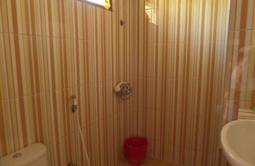 Ngadisari Bed & Breakfast | Bedroom for 4 person view direct to Mt. Bromo