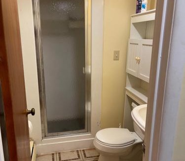 Silver Spring House | Bedroom & Shower - Two Double Beds on Ground Floor