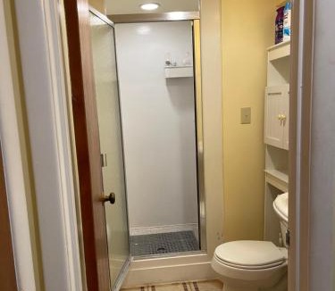 Silver Spring House | Bedroom & Shower - Two Double Beds on Ground Floor
