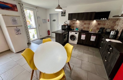 Lussac-les-Chateaux Apartment | Bedroom with private bathroom