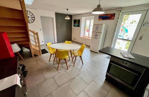 Lussac-les-Chateaux Apartment | Bedroom with private bathroom