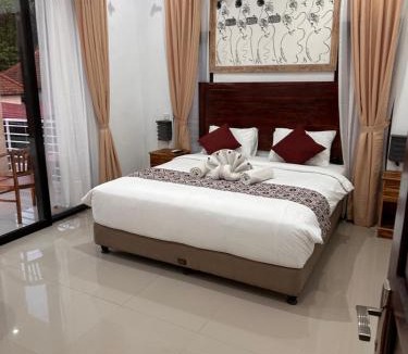 Buduk House | Bedroom with pool view Villa Uma Candi