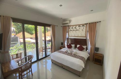 Buduk House | Bedroom with pool view Villa Uma Candi