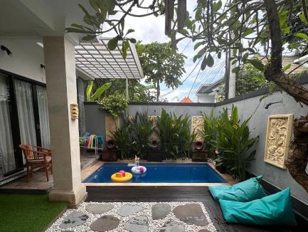 Buduk House | Bedroom with pool view Villa Uma Candi