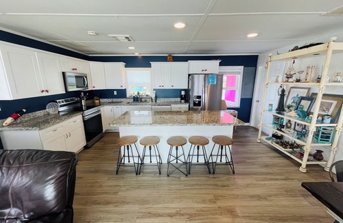 Cedar Lane House | Best Texas Fishing, Waterfront with a Swimming Pool and Pet Friendly