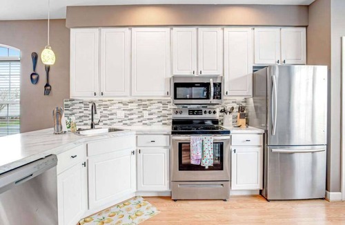 Bethany Breeze Condo | Bethany Breeze Townhouse with High-Speed WiFi, Shared Pool, & Washer/Dryer