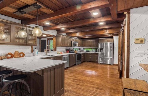 McCaysville Cabin | Big River Family Retreat - Luxury Creekside Getaway | Outdoor Kitchen & Pavillion | Screened in Porch