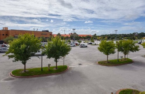 National Gardens Condo | Bike Week Perfection