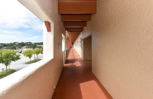 National Gardens Condo | Bike Week Perfection