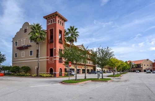 National Gardens Condo | Bike Week Perfection