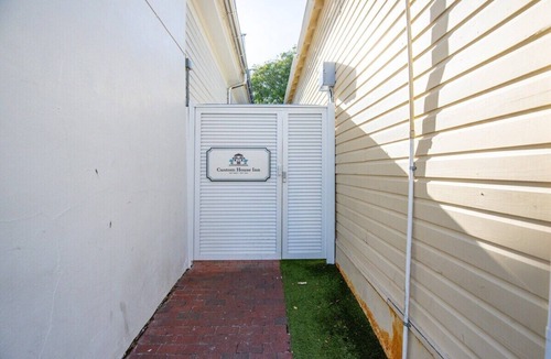 Historic Seaport Apartment | Birds of a Feather at Custom House Inn | Perfect Stay on Duval Street!