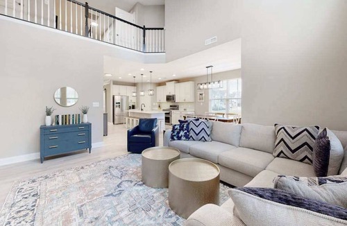 Millville Condo | Bishops Landing townhome with screened porch, patio, on-site pool & tennis