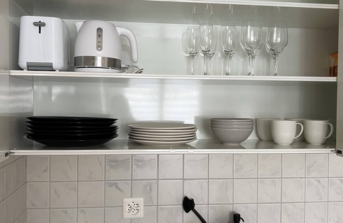 Oberuzwil Condo | Black & White Apartment