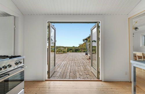 Faarevejle House | Black wooden house with panoramic views