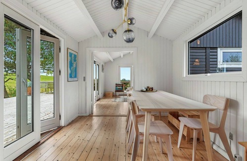 Faarevejle House | Black wooden house with panoramic views