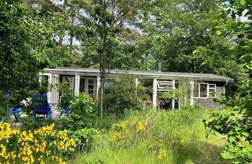 Øksenmølle House | Black wooden summerhouse near Ebeltoft
