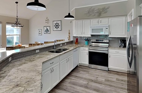 Sand Point House | Blew By You | Pet Friendly, Pool Access