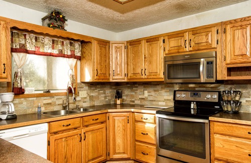 West Yellowstone House | Blocks from Yellowstone! Walk to Shops & Dining! 2 Fireplaces, Gas BBQ! Smart TV