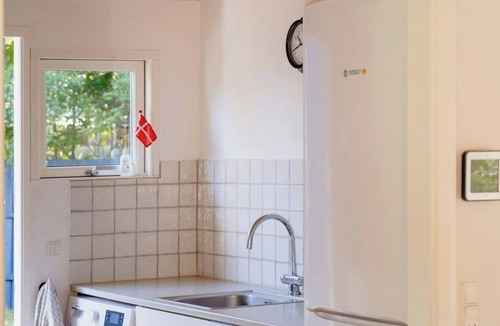 Egense House | Blue home with room for fun and comfort
