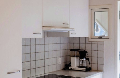 Egense House | Blue home with room for fun and comfort