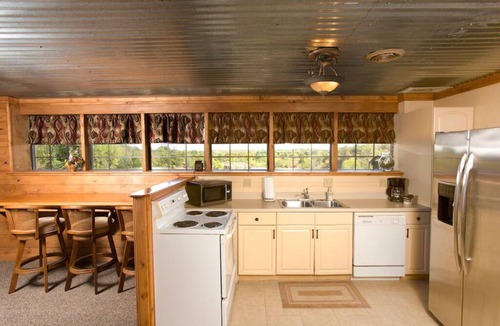 Sand Springs Cabin | Blufftop cabin with private patio and gorgeous views! Pet-friendly!
