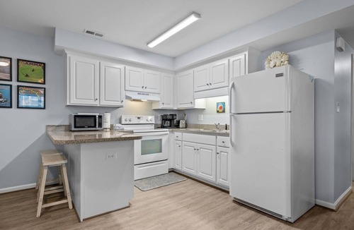 Atlantic Beach Condo | Boardwalk Shores D 2 Bedroom Duplex by RedAwning