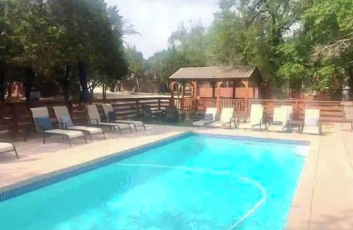 Austin Cabin | Bobcat cabin in 2 acre boutique resort with pool!