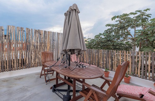 Zona Colonial Apartment | Bohechio studio with private balcony, pool views, ensuite bath, and kitchen.