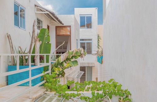 Zona Colonial Apartment | Bohechio studio with private balcony, pool views, ensuite bath, and kitchen.