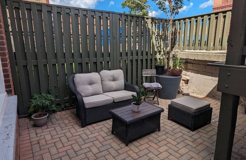 Lower West Side Apartment | Bohemian Garden Oasis! 2-BR unit with AC & WiFi in Prime Chicago.