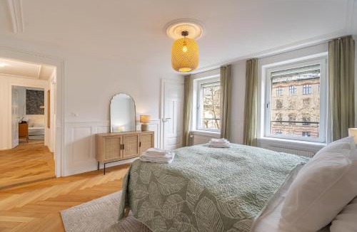 Oberstrass Apartment | Boho Suite Zürich - 80 qm, 3 Schlafzimmer, Balkon & Zugang zur Dachterrasse mit Grill & Seesicht