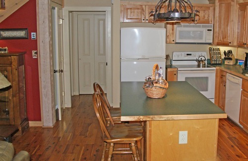 Seven Devils Cabin | Book your Spring getaway now! Firepit. Pond view.
