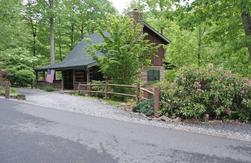 Seven Devils Cabin | Book your Spring getaway now! Firepit. Pond view.